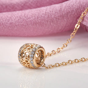 Flower wheel and zirconia pendant necklace