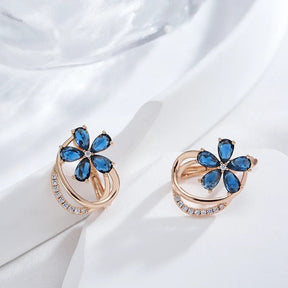 Stud earrings with sapphire cubic zirconia and white cubic zirconia in 18K Rose Gold Plating