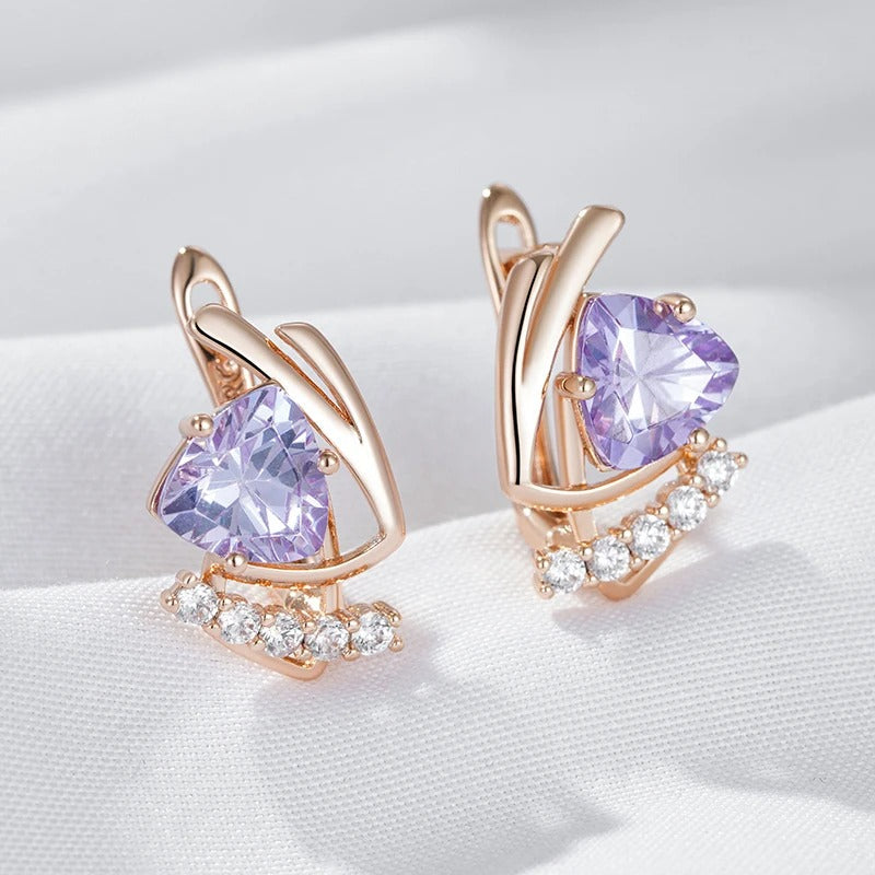 Stud earrings with shiny purple natural zirconia and small white zirconia in 18K rose gold plating