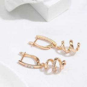 18K Rose Gold Plated curly earrings in zirconia